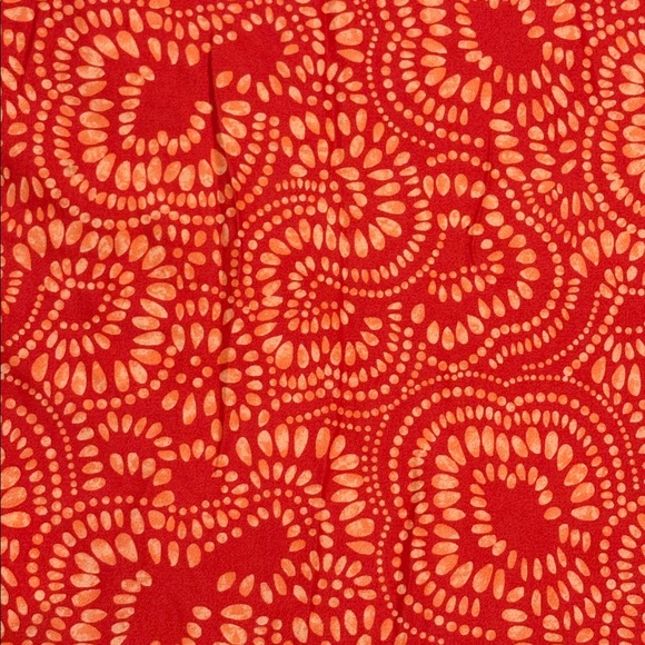 Reversible quilted pillow sham with a teal, red, and orange paisley print - Picture 3 of 9